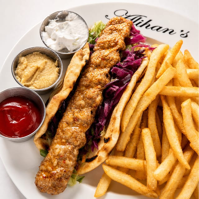 Lunch Chicken Adana, Pita, Salad.